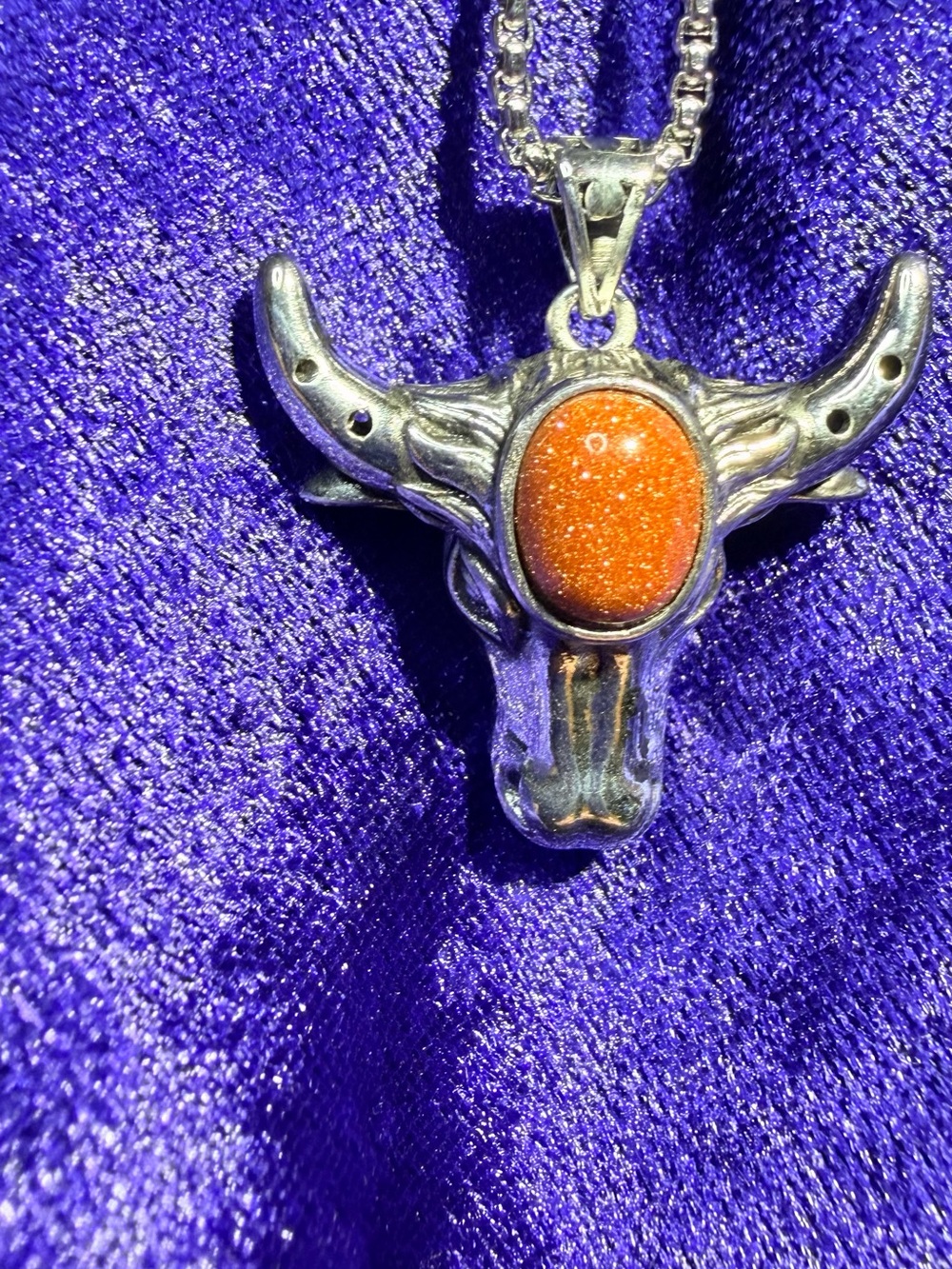 Silver Bull Head Pendant Necklace with shimmering orange gemstone comes w chain